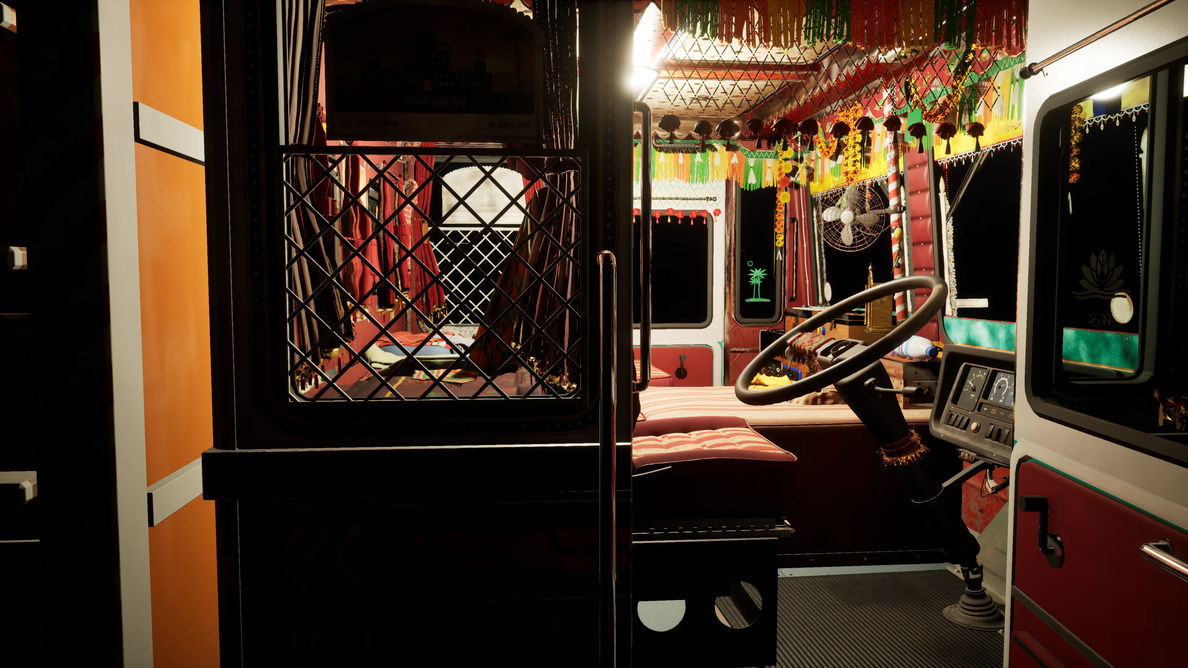 The decorated cab at night, lit by its ceiling lamp, seen through the open driver’s door